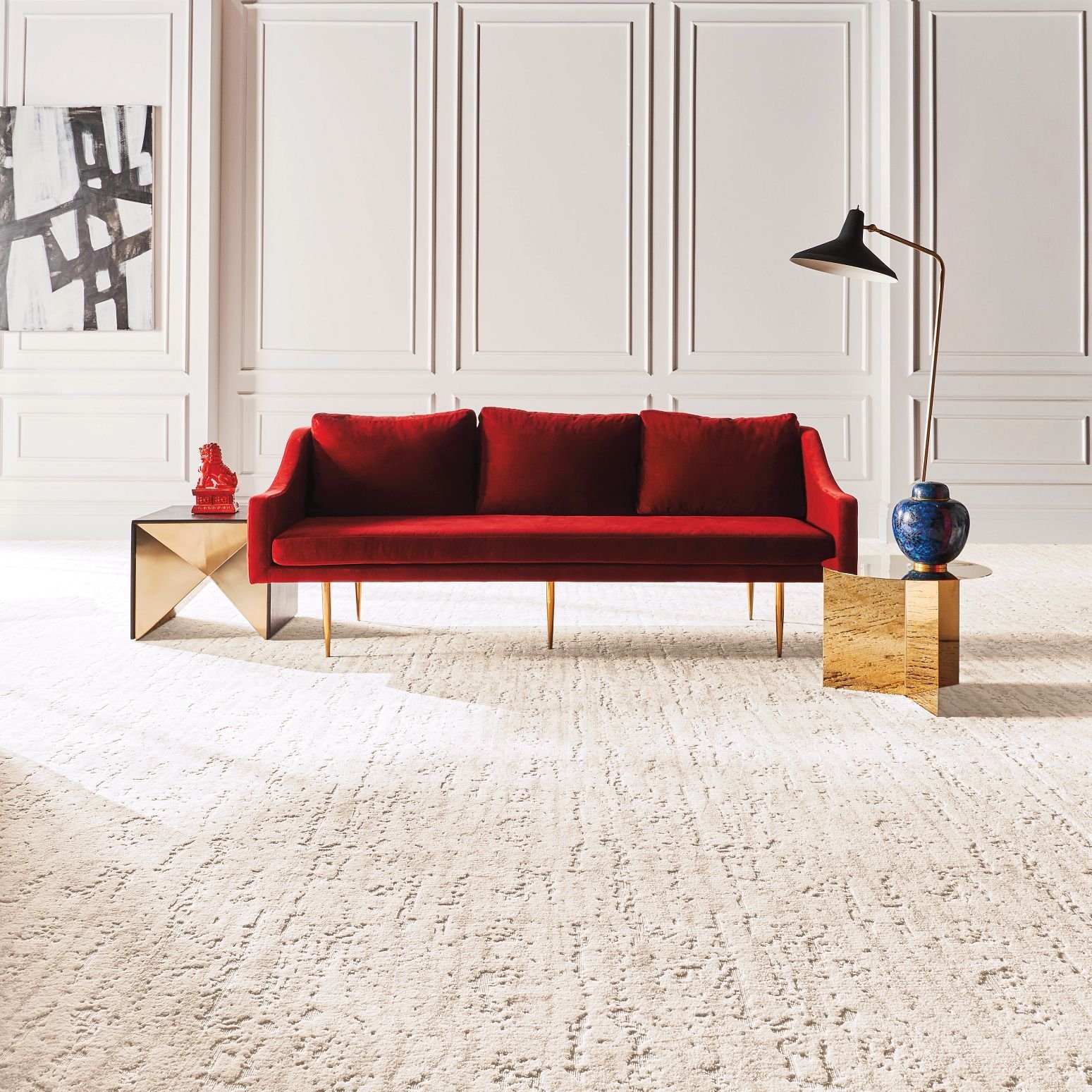 red sofa on beige carpet from Carter Carpets & Vinyl in Temperance, MI